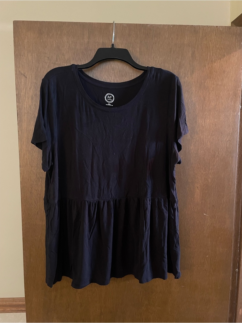 Relaxed Black Short-Sleeve Peplum Tee